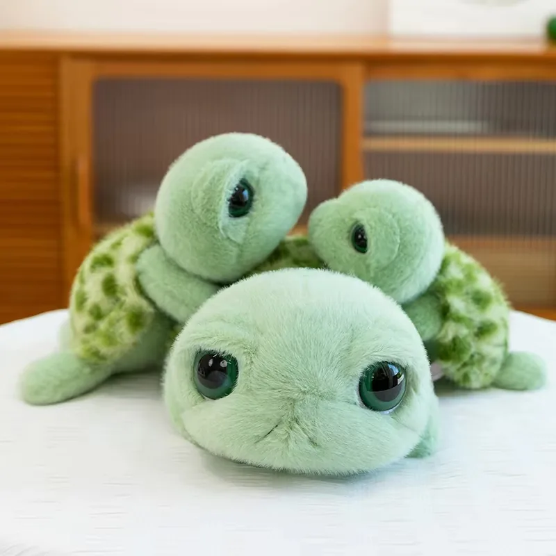 Three mint-green big eyes turtle plush dolls displayed together with rounded faces and spotted soft shells
