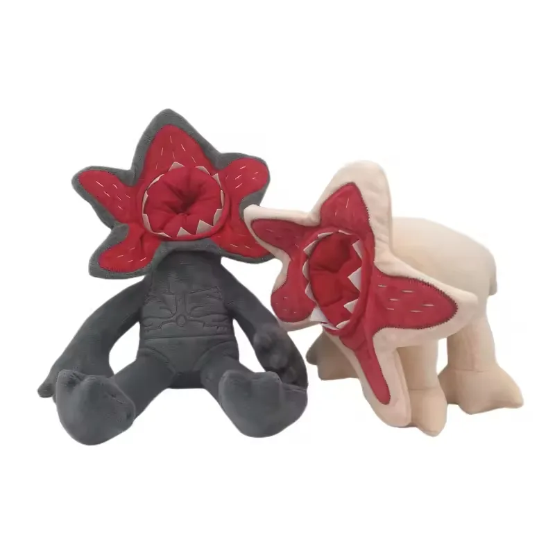 Grey Demogorgon plush doll and beige quadruped monster plush shown together with red flower-like open faces