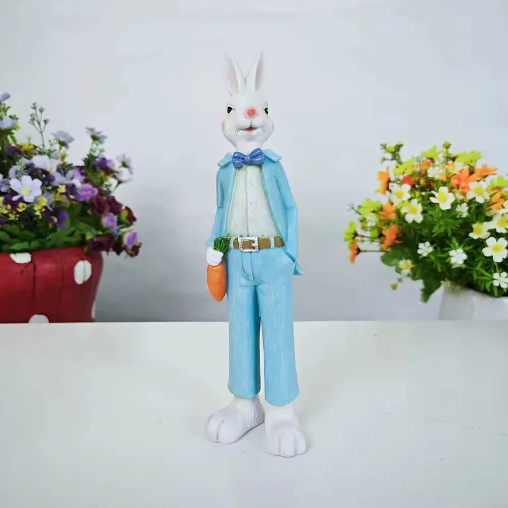 Figurine de conejo en resina pintado a mano con traje azul y una zanahoria para decoracion de mesa en Pascua y regalos de primavera