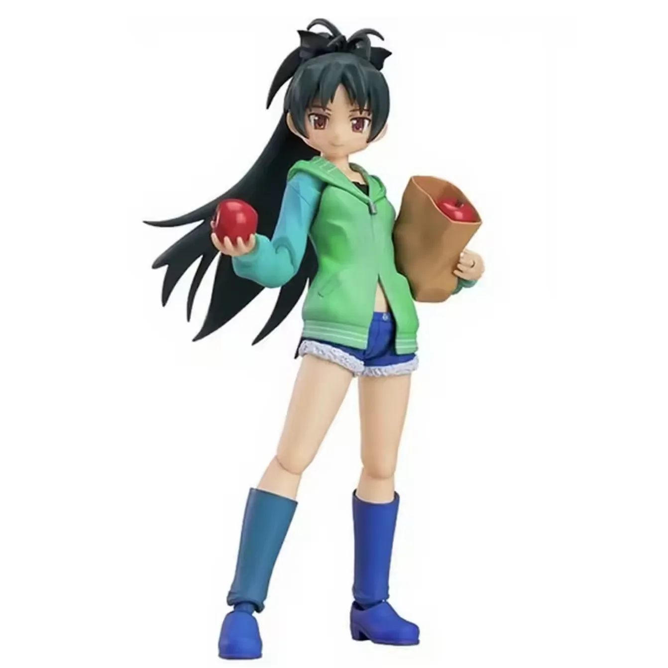 Figura PVC de chica anime con cabello oscuro, sudadera verde, botas azules, manzana roja y bolsa de compra de papel