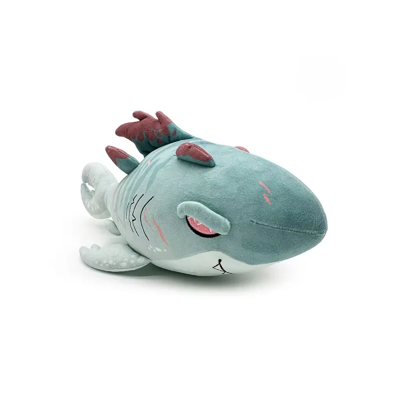 Peluche Shadowmaw Megalodon verde espuma visto en ángulo con aletas pálidas, ojo rojo y una estética de tiburón fantástico más suave