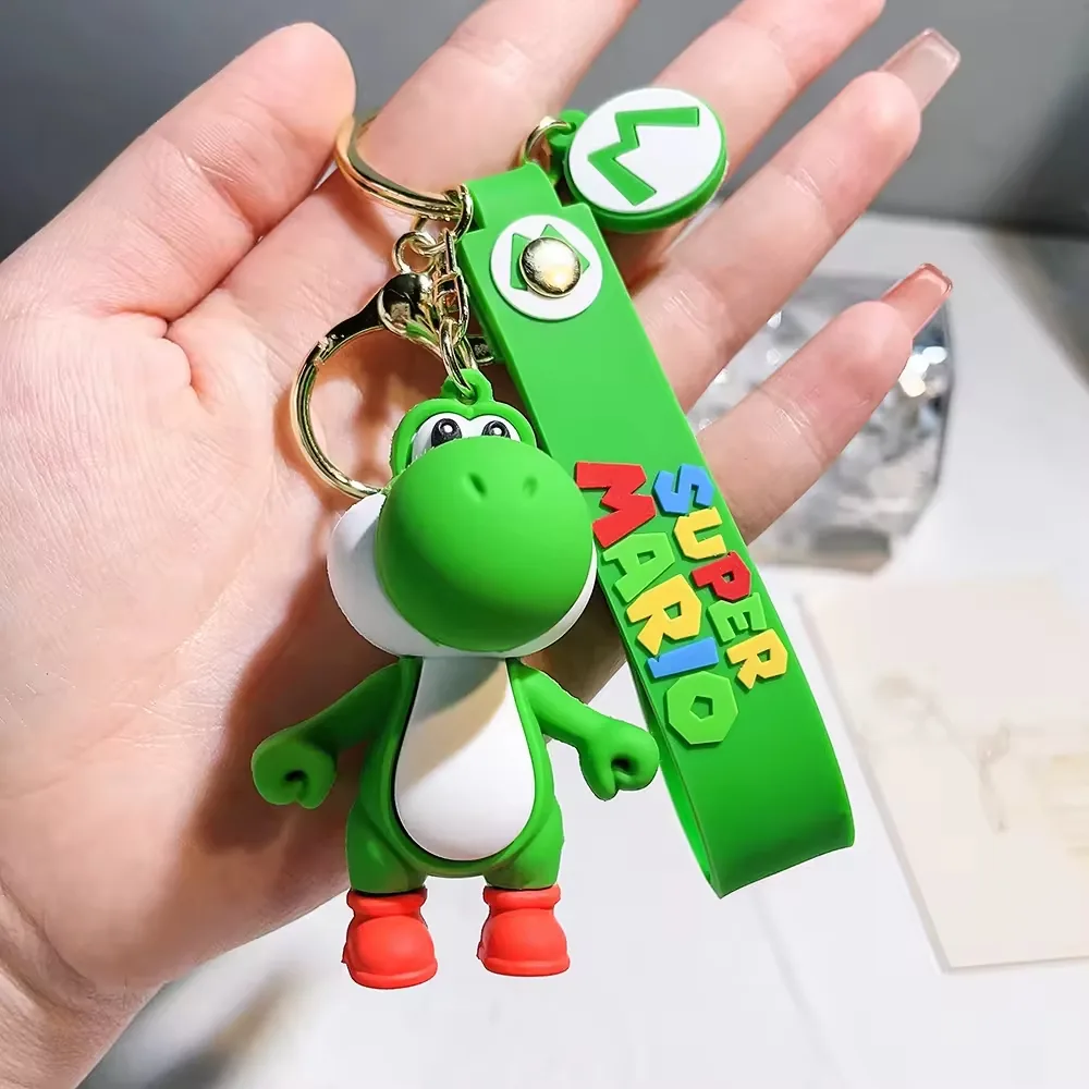 Llavero PVC de dinosaurio verde estilo Yoshi con cuerpo 3D redondeado y anilla de colgado
