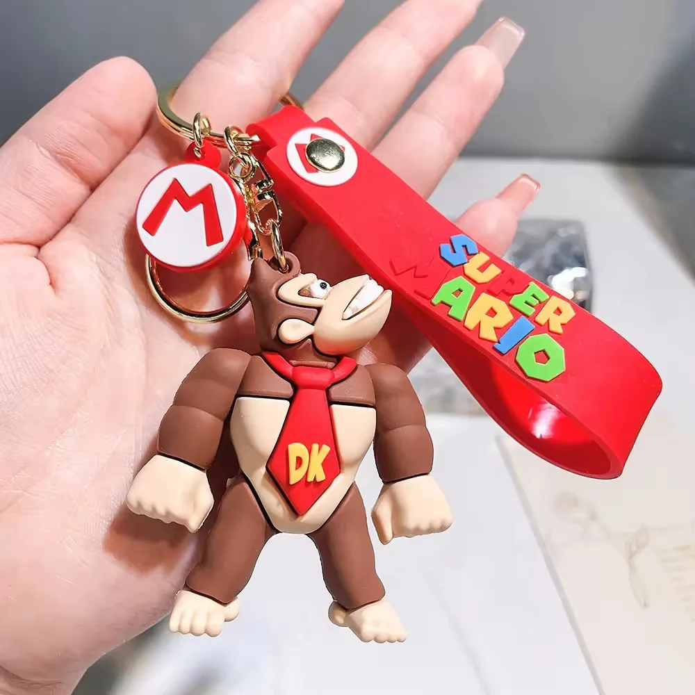Llavero PVC de personaje hongo con silueta de gorro marcada y anilla metalica partida