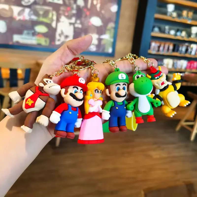 Coleccion completa de llaveros PVC de Super Mario Bros mostrada como un surtido mult personaje para merch gaming y planificacion de regalos promocionales