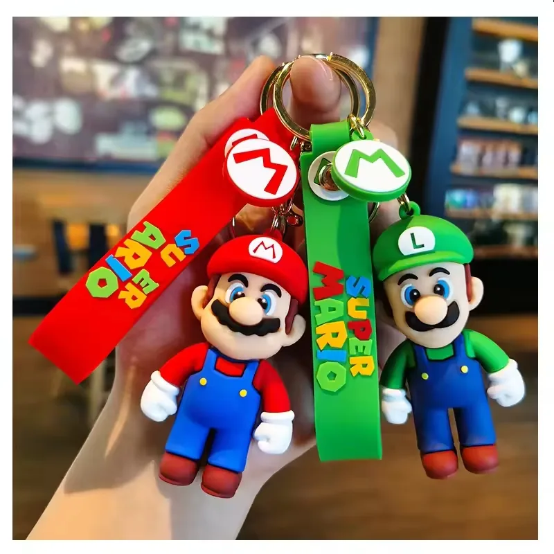 Super Mario Bros PVC keychain assortment with plumber, dinosaur, and mushroom character styles arranged as a six-SKU collection
