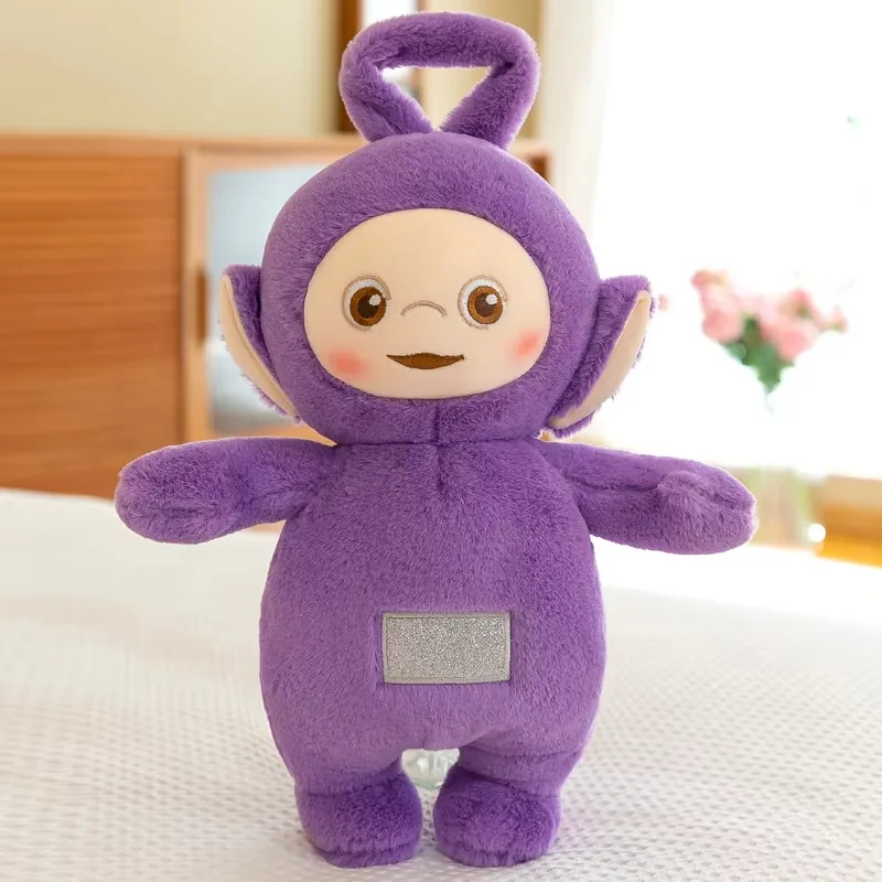 Peluche morado de muñeco Teletubbies en posición erguida con la misma silueta redondeada de edredón